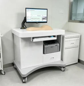 Medical Science Manikin Training Equipment with Computer Technology for Traditional Chinese Medicine Skills Assessment