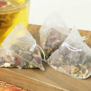 Natural Organic Fruit Herbal Tea Bags Triangle Zaoc Rosa Roxburghii Lemon Tea in Bulk Sachets Box Packaging